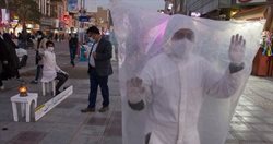 لباس عجیب ضد کرونا در خیابان های اهواز + عکسها