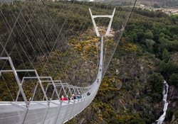 افتتاح طولانی ترین پل معلق جهان + عکسها