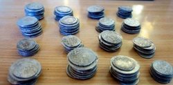 کشف 60 قطعه انواع سکه عتیقه مربوط به دوره صفویه در کرمان