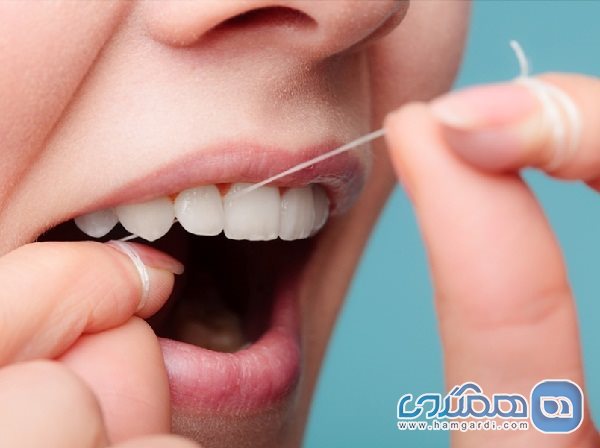 برای حفظ بهداشت دهان و دندان در سفر، نخ دندان به همراه داشته باشید