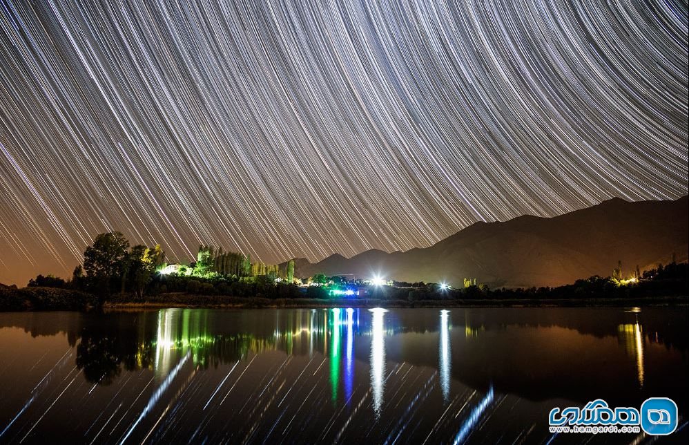 آسمان قزوین و انعکاس آن در آب دریاچه اوان | عکس از امیر ابولفتح